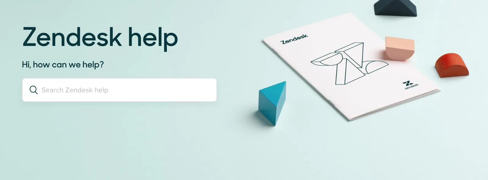 Zendesk help center interface with search bar and abstract shapes.