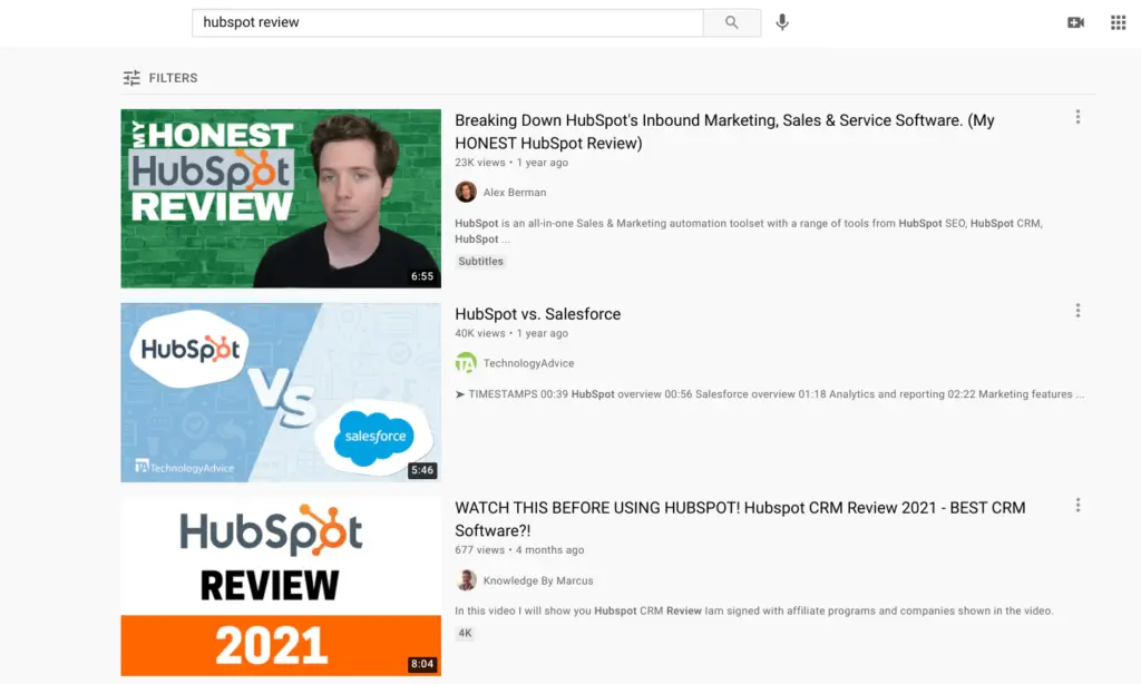 HubSpot review video thumbnails showcasing user testimonials and comparisons.